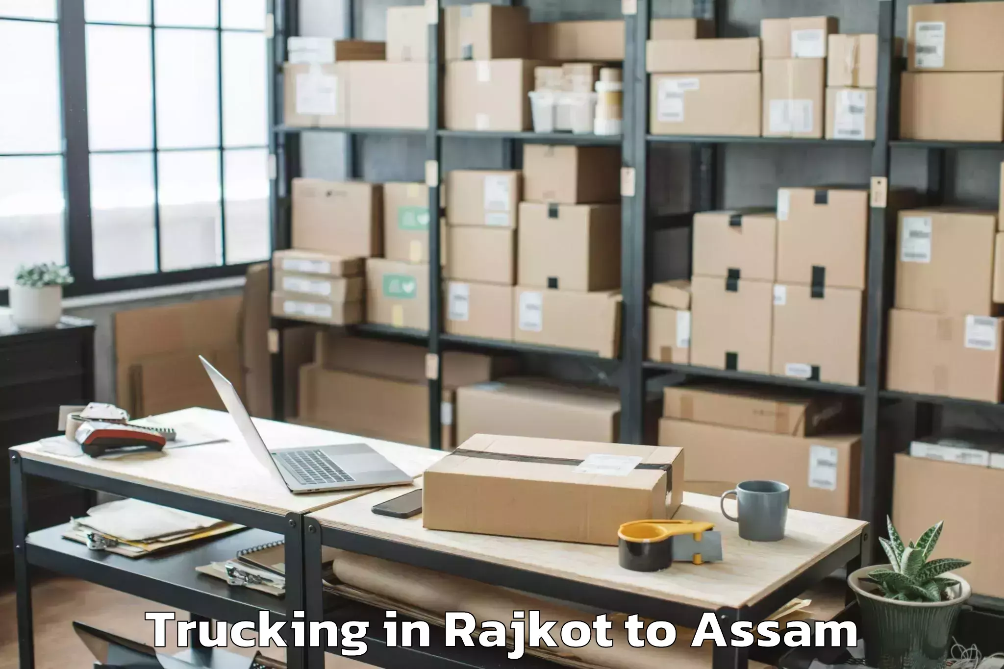 Book Rajkot to Sissibargaon Trucking Online